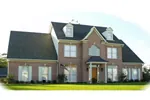 Colonial House Plan Front of Home - Spruce Orchard Luxury Home 087D-1048 - Shop House Plans and More