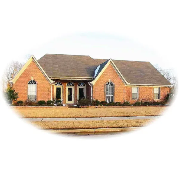 Stunning Arched Windows Decorate This Traditional Façade