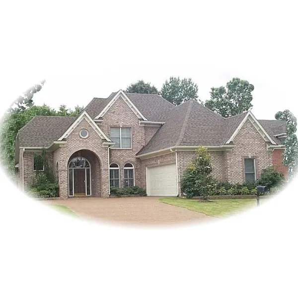 A Wide Arched Entry Adorns This Luxury Home