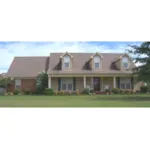 Inviting Porch and Trio Of Dormers Grace Cape Cod Home's Exterior