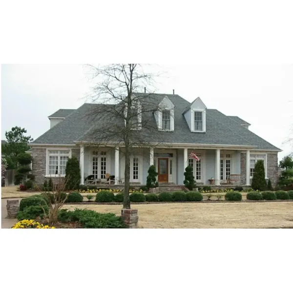 Southern Country Home With Porch And Triple Dormers