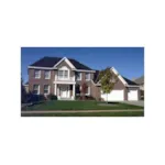 Colonial Style Home Features Balcony Above Entrance