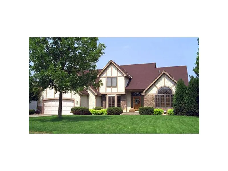 Tudor Style House With Soothing Wood Trim Details