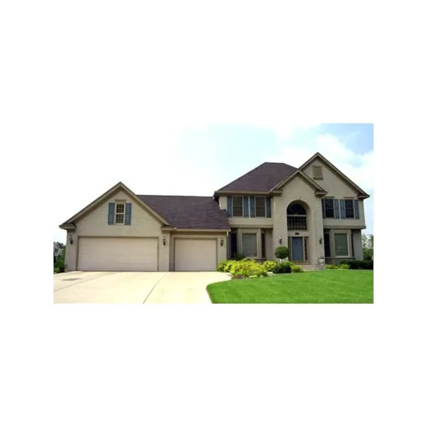 Traditional Home Flanked With Twin Bay Windows And Arched Entry