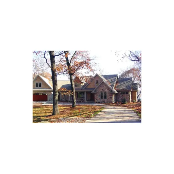 Sprawling Home With Stone Accent Walls And Multiple Gables