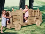 Children's wood fire engine is a great play structure with old-fashioned country charm