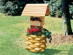 Landscape timber wishing well has log style design great for rustic environments