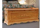Ornate hope chest is large in size and is the ideal place to store mementos and family photos