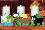 Woodland paper towel holders are decorated with a fish, moose and black bear