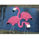 Big 3D flamingos are a fun statement for a tropical or coastal outdoor setting