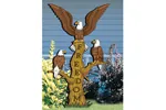 Freedom flyers yard art pattern has three bald eagles perched on a tree trunk