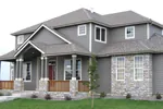 Stone Adds great Craftsman Style To The Exterior Of This Two-Story House