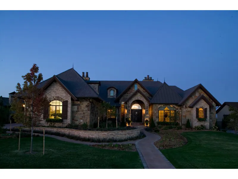 Luxury House Plan Front Night Photo 01 - Brick and Stone Home 101S-0024 | Stone Exterior Home