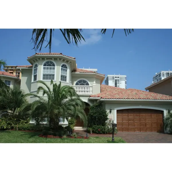 Eye-Catching Stucco Siding And Clay Roof