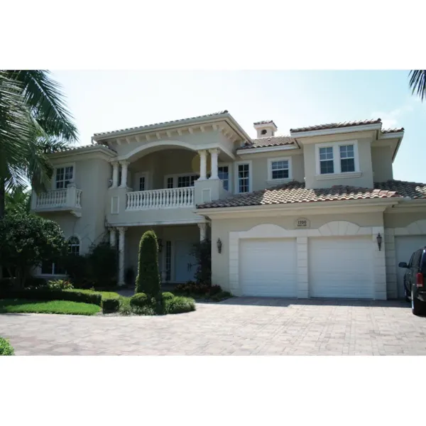 Classic Mediterranean Home With Towering Covered Entrance