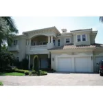 Classic Mediterranean Home With Towering Covered Entrance