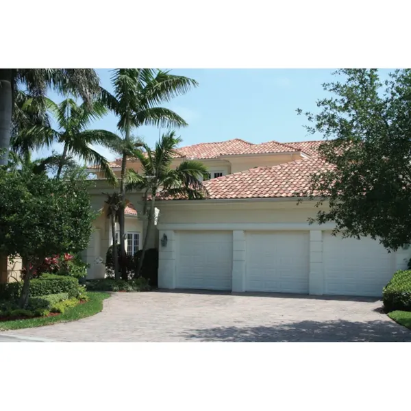 Floridian Style Stucco Home With Clay Tile Roof