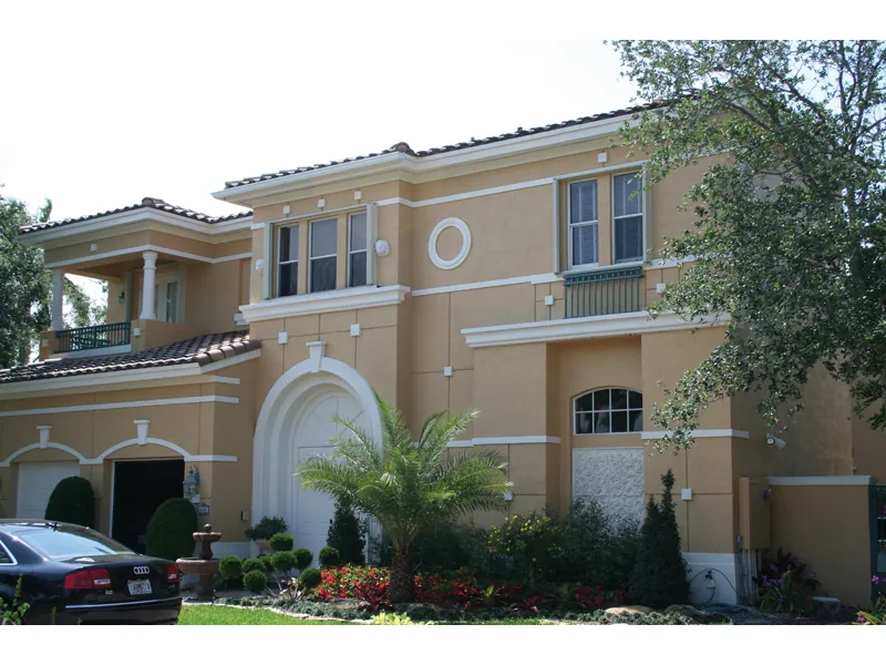 Stucco Two-Story With Elegant Formal Front Facade