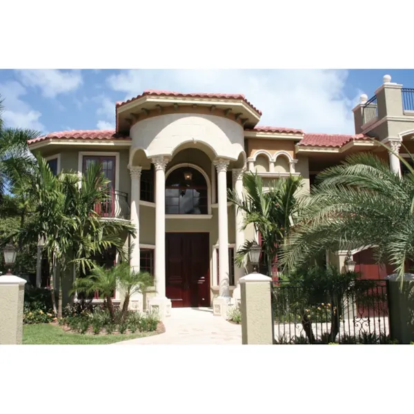 Spanish Stucco Home With Intricate Iron Details