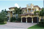 Mediterranean Stucco Home With Clay Tile Roof