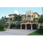 Mediterranean Stucco Home With Clay Tile Roof