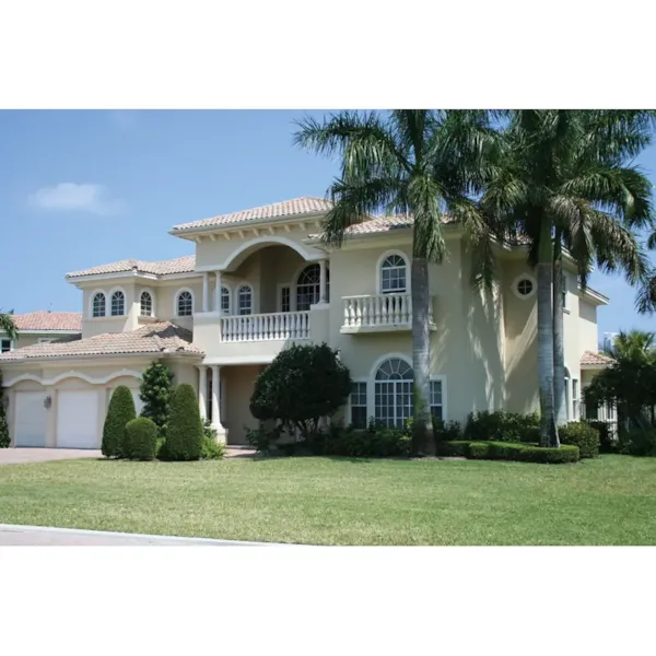 Two-Story Stucco House With Covered Porch And Second Floor Terrace