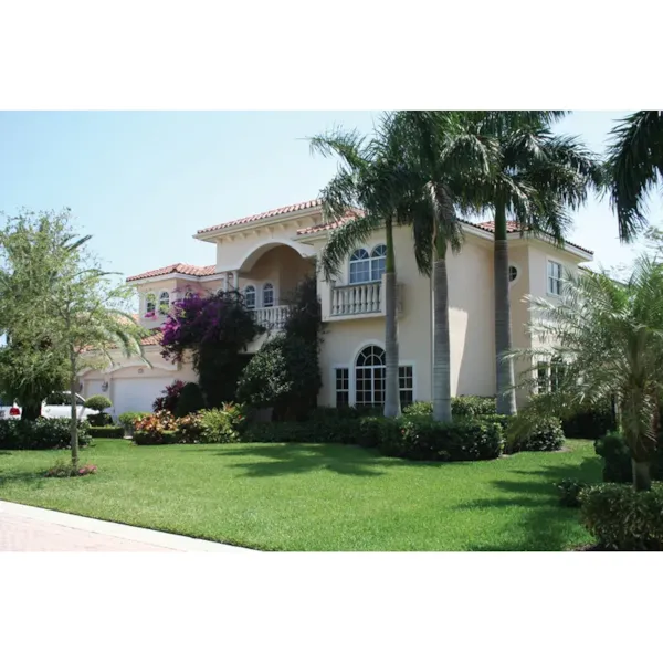 Two-Story Stucco Luxury Home With Spanish Wrought-Iron Balcony