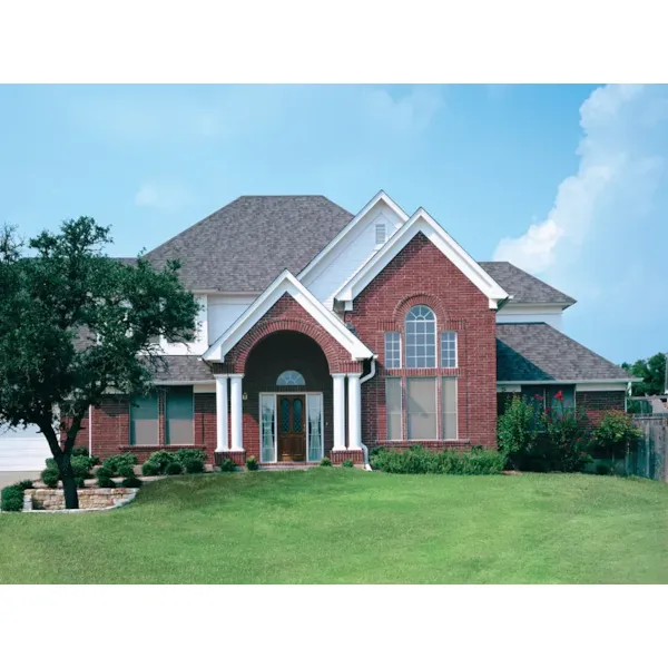 Tradtional Style Two-Story With Impressive Front Arched Entry Porch