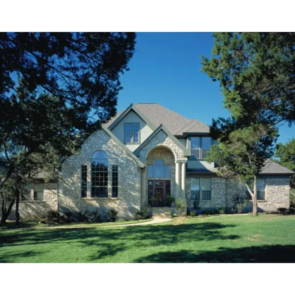 Two-Story House With Eye-Catching Arched Entry