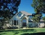 Two-Story House With Eye-Catching Arched Entry