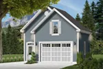 Charming country style two-car garage with double gable front exterior