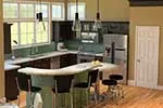 Modern Farmhouse Plan Kitchen Photo 02 - Abigail Traditional Ranch Home 121D-0011 - Search House Plans and More