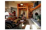 Rustic House Plan Living Room Photo 01 - Prairie Wind Luxury Home 163D-0009 - Shop House Plans and More