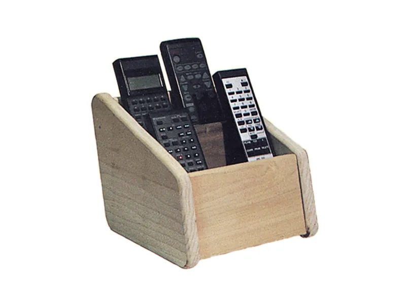 Remote holder is mad eof wood and gathers up all the different remote controls found around the room