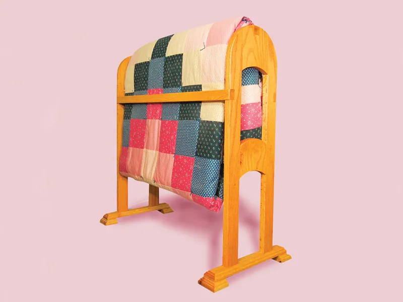 Sturdy all wood quilt rack is perfect for displaying a prized quilt collection