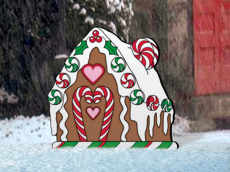 Cute gingerbread house design looks great with the gingerbread man and woman