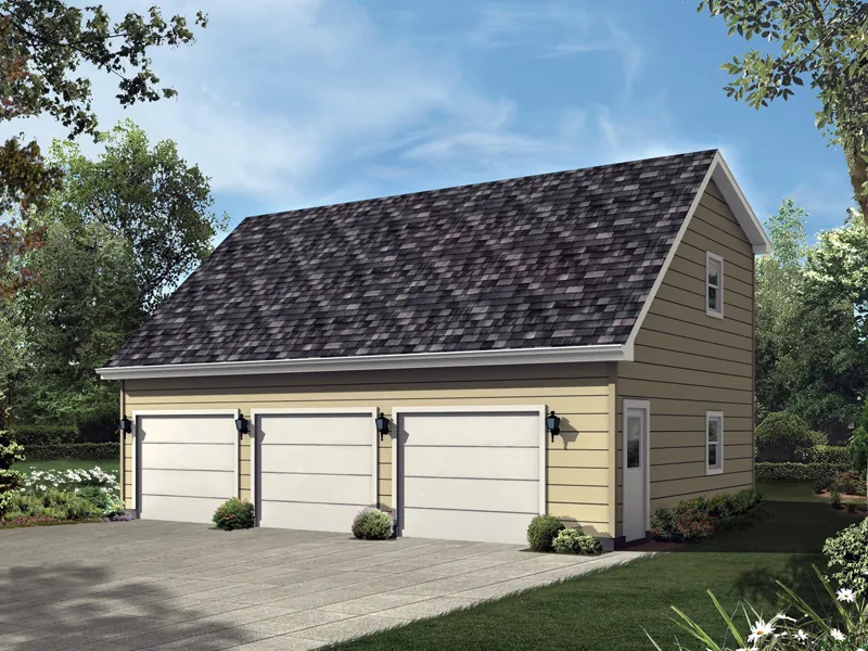 Three-car garage has the look of a one-story when actually it has a vaulted loft on the second floor