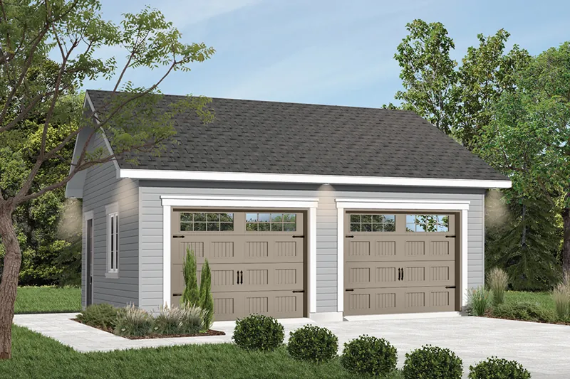 Spacious two-car garage has charming country style garage doors