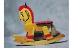 Rocking horse can be painted to include colors to match a children's bedroom